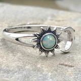 Anello vintage con sole e luna in opale