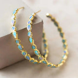 Orecchini vintage in opale blu dorati